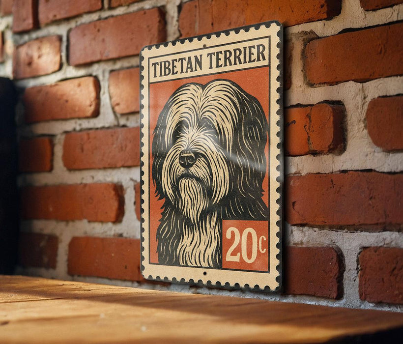 A wooden table with a wooden surface, and a framed poster of a Tibetan Terrier dog on the wall.