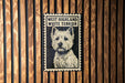 A metal sign with a black and white illustration of a white terrier dog, mounted on a wooden wall.