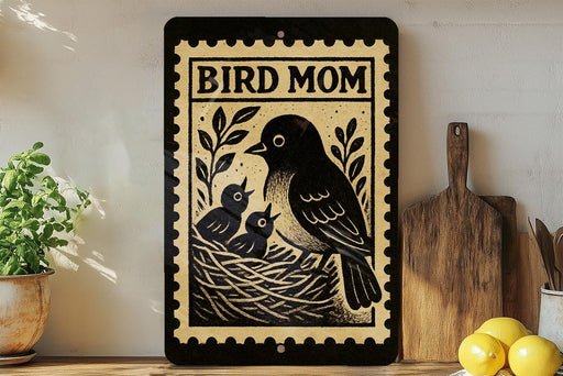a decorative sign with a bird illustration, placed on a shelf next to a wooden cutting board and some potted plants.