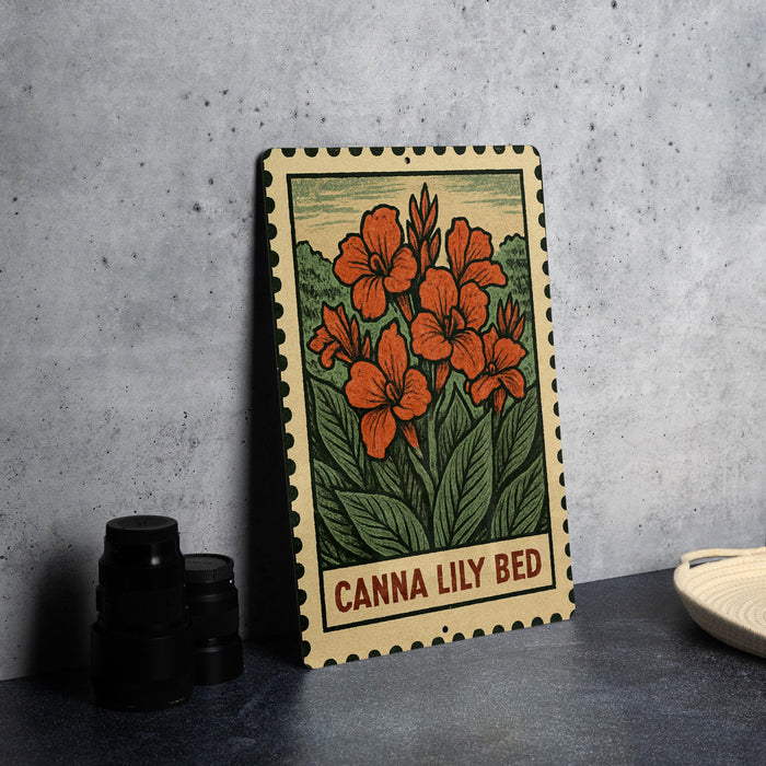 a wooden frame with a floral illustration of a lily bed, placed on a table next to some black camera lenses.