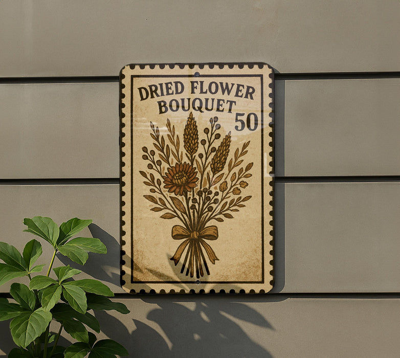 a sign for a dried flower bouquet, with a plant in the foreground.
