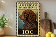A vintage-style metal sign featuring an illustration of an American Water Spaniel dog, with the text "AMERICAN WATER SPANIEL" and the price "10c" printed on it.
