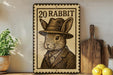 A vintage-style metal sign featuring a rabbit wearing a hat, with a wooden cutting board and a potted plant in the background.
