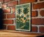 A framed illustration of palm trees is displayed on a brick wall, with the text "PALM GROVE" visible.