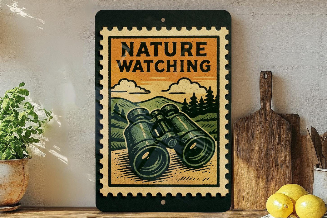 A vintage-style metal sign with a nature-themed illustration, featuring a pair of binoculars, is displayed on a shelf next to a wooden cutting board and a potted plant.