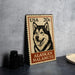 A wooden sign featuring a black and white illustration of a husky dog, with text indicating it is a 20c United States postage stamp for Alaska Malamute dogs.