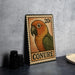 A colorful postage stamp featuring a parrot, with the word "CONURE" printed on it.