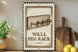 a wall peg rack with the text "WALL PEG RACK" on it, along with a wooden board and a potted plant.