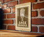 A sign with the text "SAGE BUNDLE" is displayed on a brick wall, indicating that the image is a promotional sign for a bundle of essential oils or other related products.