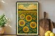 a framed painting of a field of sunflowers, with a wooden cutting board and lemons placed next to it on a shelf.