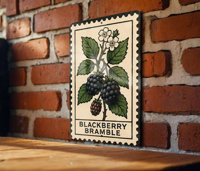 A vintage-style metal sign with a black and white illustration of a raspberry bush and berries, mounted on a brick wall.