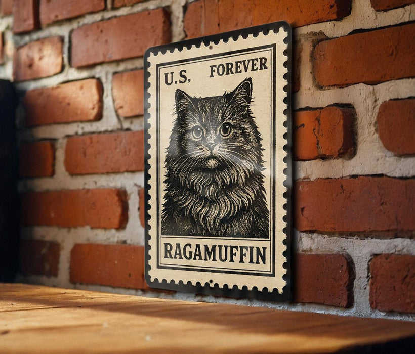 A framed image of a cat, likely a Ragamuffin, is displayed on a brick wall.