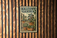A metal sign with a vintage design, featuring a balcony garden scene with potted plants and a balcony railing.