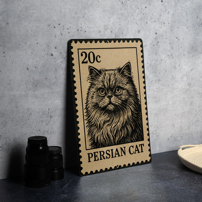 A metal stamp featuring a close-up of a Persian cat, with the text "20c" and "PERSIAN CAT" printed on it.