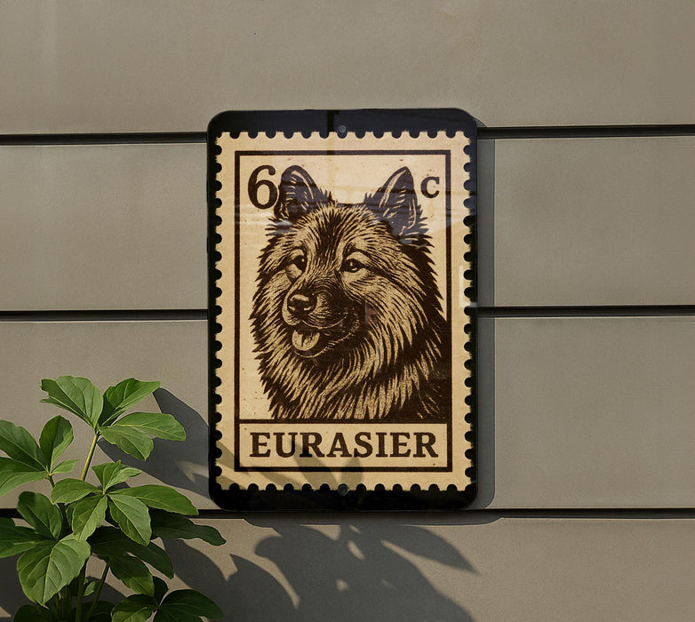 a large stamp-like sign with a dog's head and the word "EURASIER" printed on it, mounted on a wall.