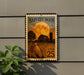 A metal sign with a large stamp depicting a farm scene with a full moon and a barn, mounted on a wall.