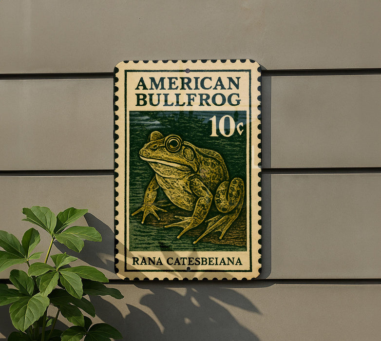 a green and white stamp-like sign with an illustration of a bullfrog, mounted on a wall.
