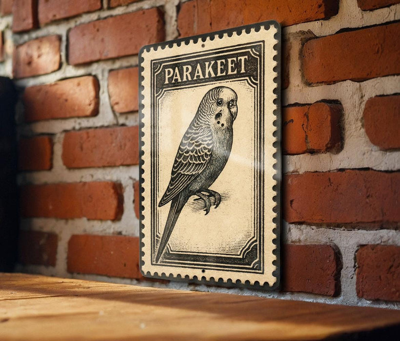 A vintage-style postage stamp featuring a parakeet is displayed on a brick wall.
