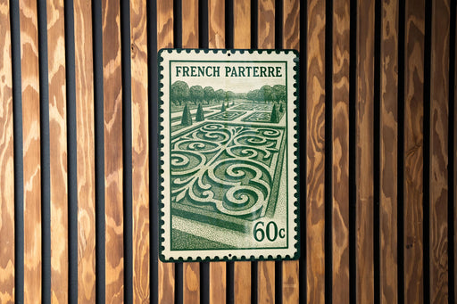 A French postage stamp with a garden design on it, displayed on a wooden wall.