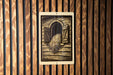 a wooden wall with a framed illustration of a horse's mane hanging on it.
