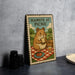 A metal sign with a cartoon hamster sitting on a picnic blanket, eating a sandwich, and holding a basket of food.