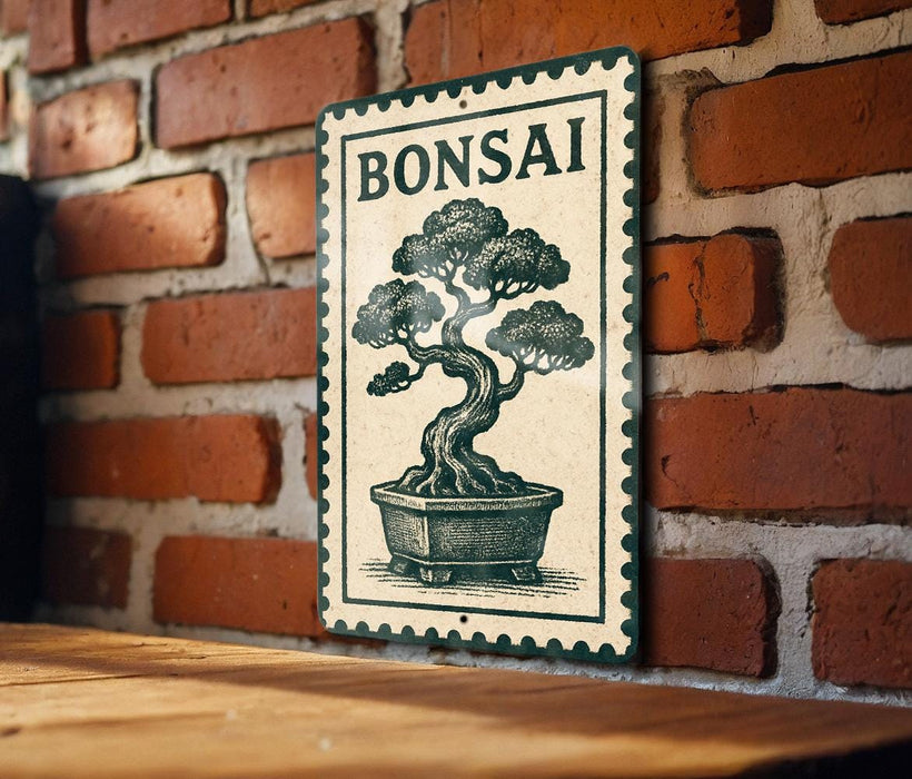 A metal sign with a bonsai tree illustration is mounted on a brick wall.