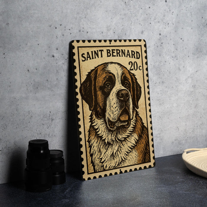 A metal frame with a postage stamp design featuring a Saint Bernard dog.