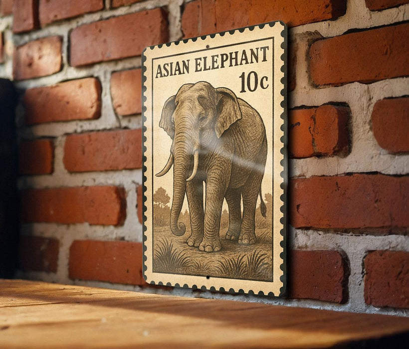 a wooden table with a framed Asian elephant stamp on the wall.