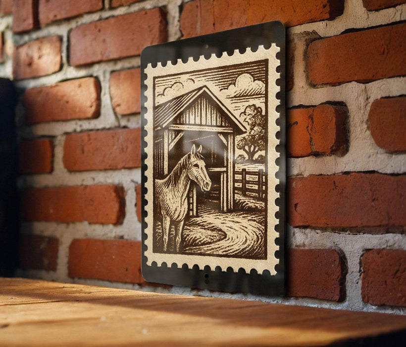 A black and white illustration of a horse standing in front of a barn is mounted on a brick wall.