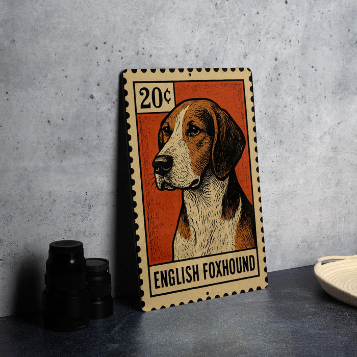 A metal stamp featuring an illustration of an English foxhound dog, with the text "20¢" and "ENGLISH FOXHOUND" printed on it.