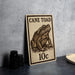A sign featuring a toad illustration and the text "CANE TOAD 10c" is displayed on a table.