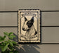 a bull terrier, a small dog breed, mounted on a wall.