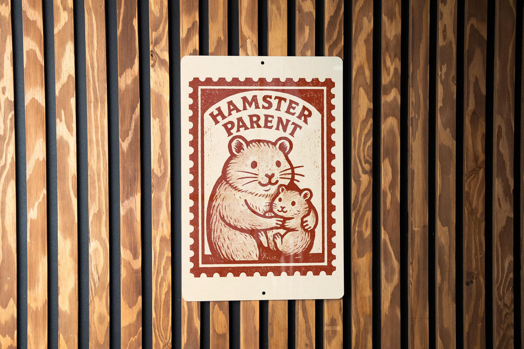 A sign with the text "HAMMSTER PARENT" and an illustration of a hamster holding a baby hamster.