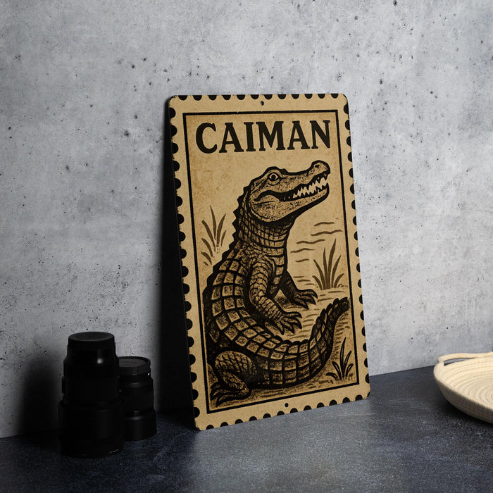 a metal sign with a crocodile illustration, placed on a countertop next to some black camera lenses.