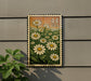 A postage stamp-like sign with a field of white daisies and the number 44 printed on it, mounted on a wall.