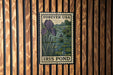A vintage Forever USA postage stamp featuring an illustration of an iris pond, with the text "Forever USA" and "Iris Pond" printed on it.