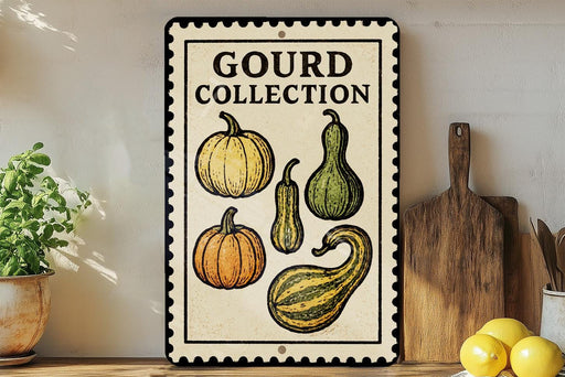 A decorative sign for a gourd collection, featuring illustrations of various gourds and a pumpkin, placed on a wooden surface next to kitchen utensils.