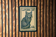 A postage stamp featuring a cat, with the text "LAPERM CAT 44c" printed on it.