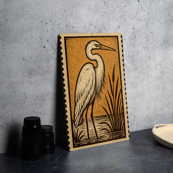 a large, detailed illustration of a heron standing on a rock, with a basket and other objects in the background.