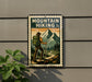 A vintage-style metal sign with a hiker and mountains in the background, mounted on a wall.