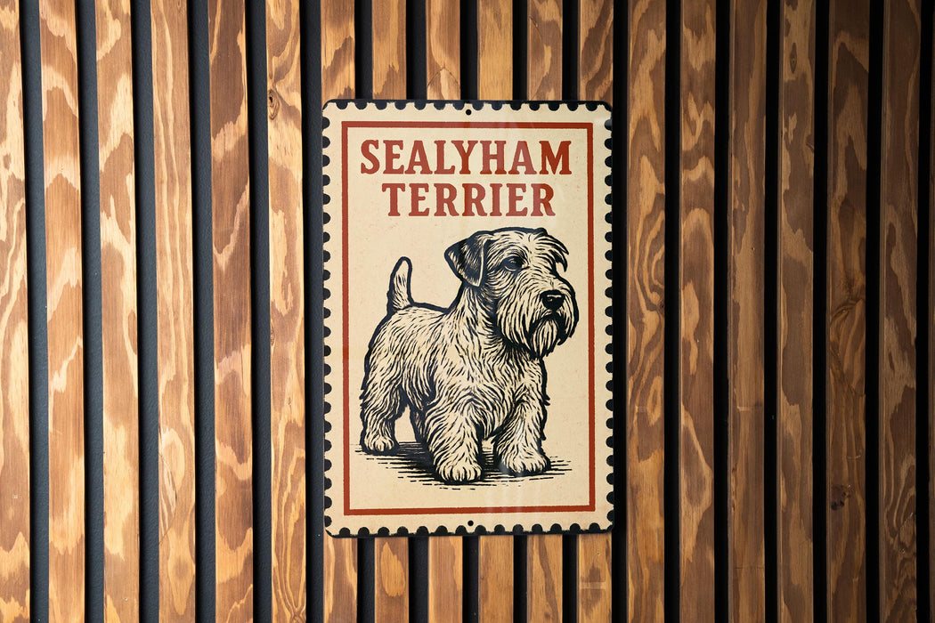 A metal sign with the text "SEALYHAM TERRIER" and an illustration of a terrier dog.