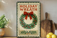 A vintage-style metal sign with the text "HOLIDAY WREATH" and a wreath design, placed on a wooden shelf next to a wooden cutting board and a potted plant.