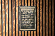 a brick wall with a black and white illustration of a brick wall on it.