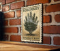 A vintage-style metal sign with a rosemary bush illustration is mounted on a brick wall.