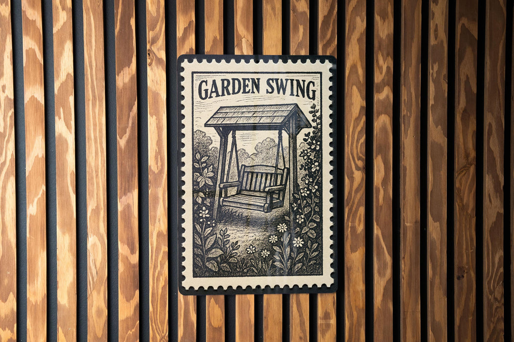 A garden swing is depicted on a wooden wall, with a black and white stamp-like design above it.