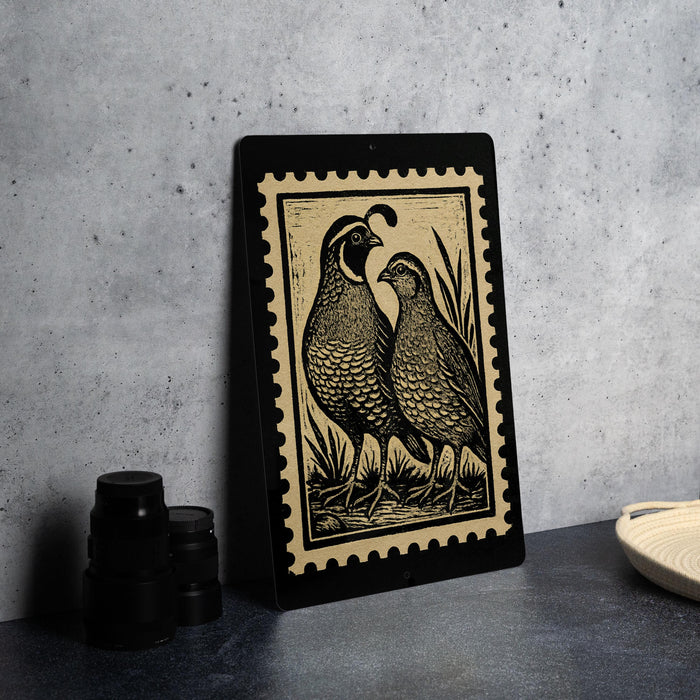 a framed illustration of two birds, likely a quail, standing together on a surface.