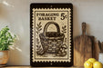 a black and white illustration of a basket on a wall, with a stamp-like border.