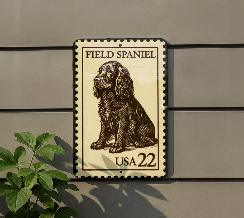 A metal sign with a picture of a Field Spaniel dog, mounted on a wall.