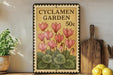 A vintage-style stamp with a floral design and text, placed on a wooden surface next to a potted plant and a wooden cutting board.