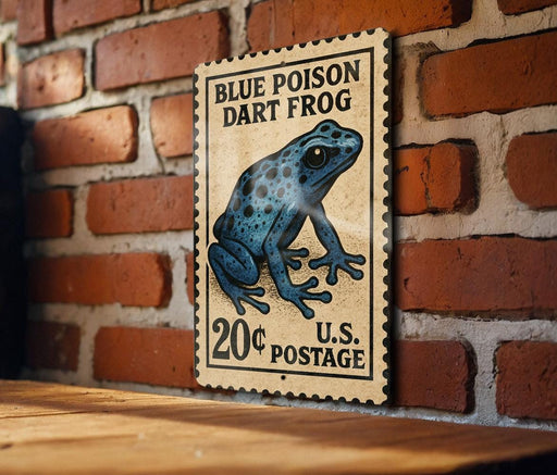 A vintage-style postage stamp featuring a blue poison dart frog, mounted on a brick wall.